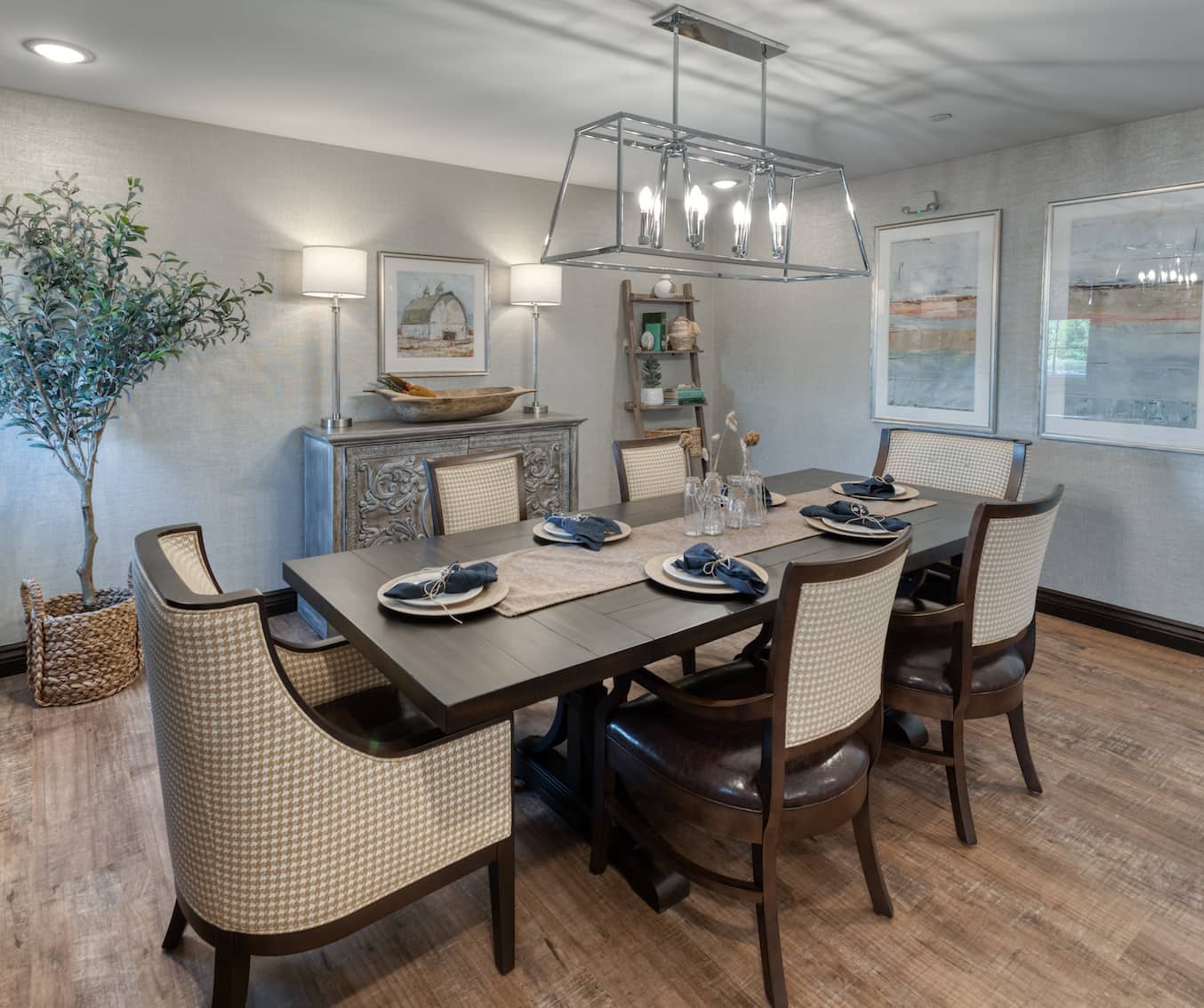 Dining room layout with custom light feature and fireplace